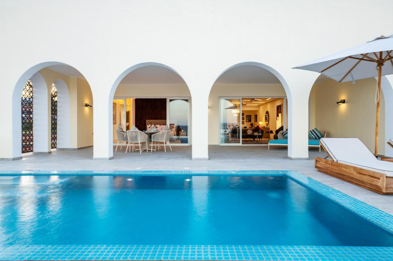 Hotel The Mora Zanzibar Matemwe  Exterior foto A pool at the hotel