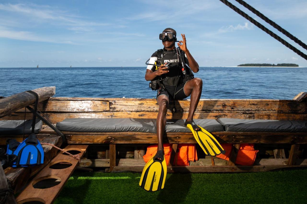 Hotel The Mora Zanzibar Matemwe  Exterior foto Scuba diver with a pair of open heel fins